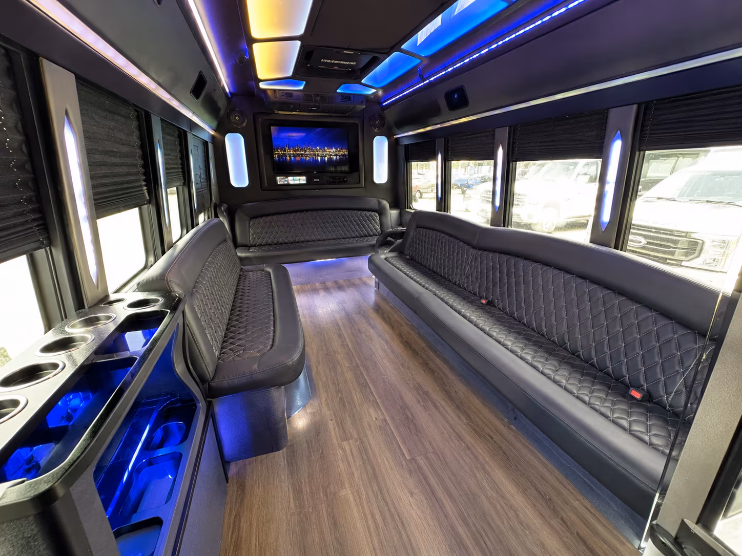 Wedding guests seated inside a party bus serving Anchorage